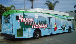 2008 Holiday Bus Graphic with Penguins playing in the snow.